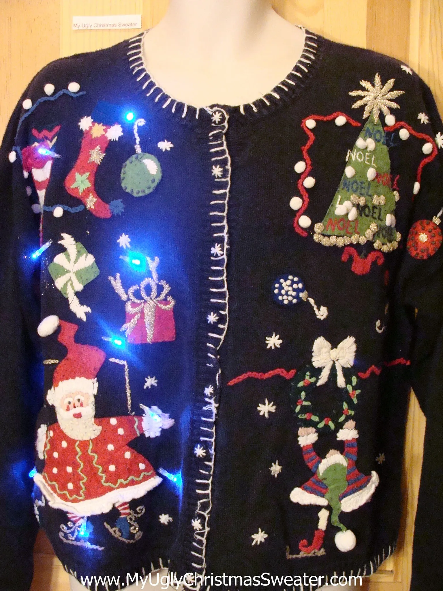 Need to Buy Christmas Sweaters? Light Up Sweater with Skating Santa and Elf